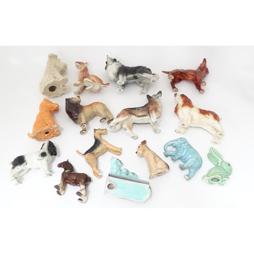 347 - A quantity of assorted ceramic models of dogs to include a Beswick Airedale Terrier - Champion Cast ... 