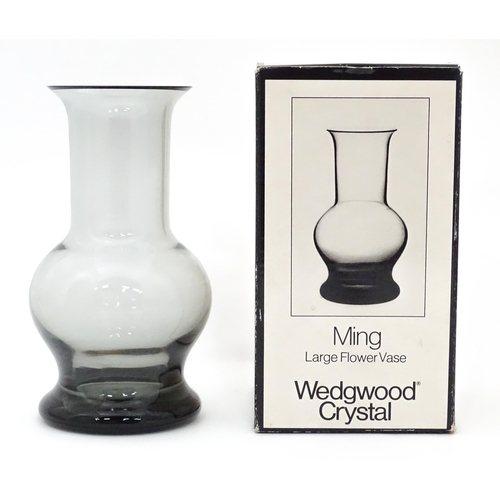 633 - A Wedgwood Crystal Ming vase, with original box. Approx. 7