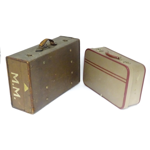 225 - Two mid 20thC suitcases, the largest example constructed from canvas with bamboo binding,  approx 24... 