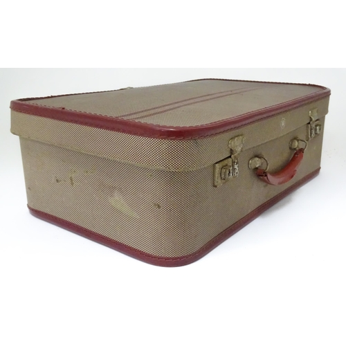 225 - Two mid 20thC suitcases, the largest example constructed from canvas with bamboo binding,  approx 24... 