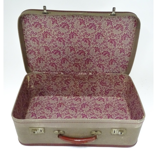 225 - Two mid 20thC suitcases, the largest example constructed from canvas with bamboo binding,  approx 24... 