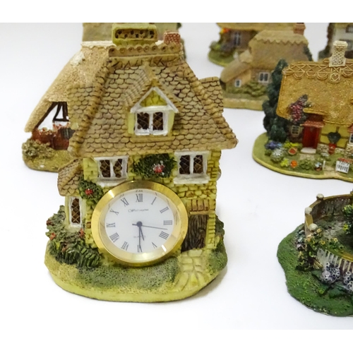 226 - A quantity of Lilliput lane and Leonardo model houses / buildings, the largest approx 3 3/4