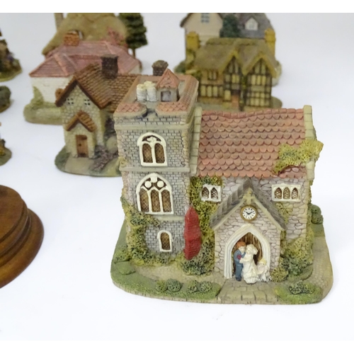 226 - A quantity of Lilliput lane and Leonardo model houses / buildings, the largest approx 3 3/4