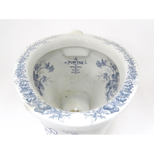 234 - A Victorian blue and white toilet with floral decoration, titled The Puritas Washdown Closet No. 167... 