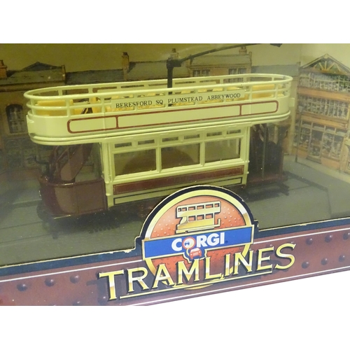 236 - Toys: six assorted model trams By Atlas Editions and Corgi, and a trolleybus by Days Gone By. The la... 