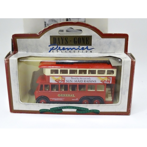 236 - Toys: six assorted model trams By Atlas Editions and Corgi, and a trolleybus by Days Gone By. The la... 