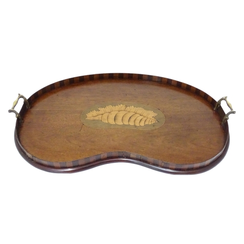 240 - A Victorian mahogany and boxwood tray, of kidney form with brass handles and inlaid shell decoration... 