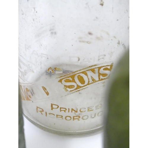 244 - A quantity of old bottles to include gingerbeers, codd, Princes Risborough milk bottle with original... 