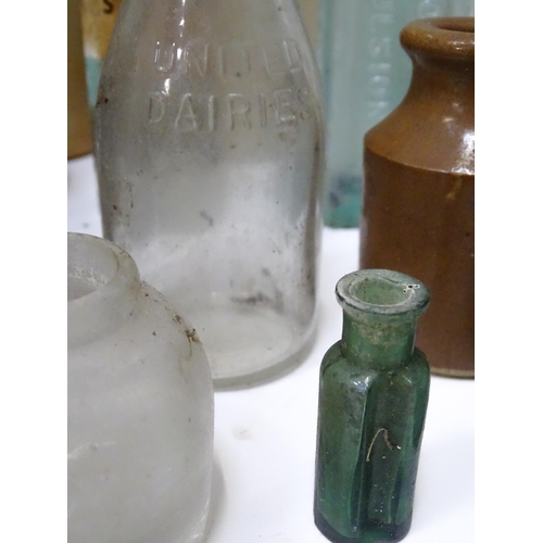 244 - A quantity of old bottles to include gingerbeers, codd, Princes Risborough milk bottle with original... 