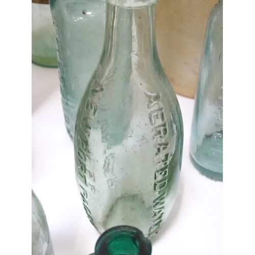 244 - A quantity of old bottles to include gingerbeers, codd, Princes Risborough milk bottle with original... 