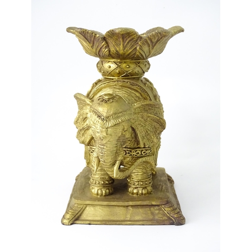 288 - A cast candle stand formed as an elephant and howdah, with gilded finish, approx 8