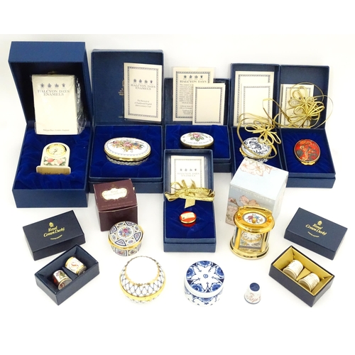 289 - A quantity of boxed Halcyon Days enamelled pill boxes and clock, together with boxed Royal Crown Der... 