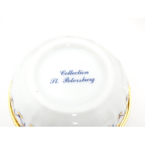 289 - A quantity of boxed Halcyon Days enamelled pill boxes and clock, together with boxed Royal Crown Der... 