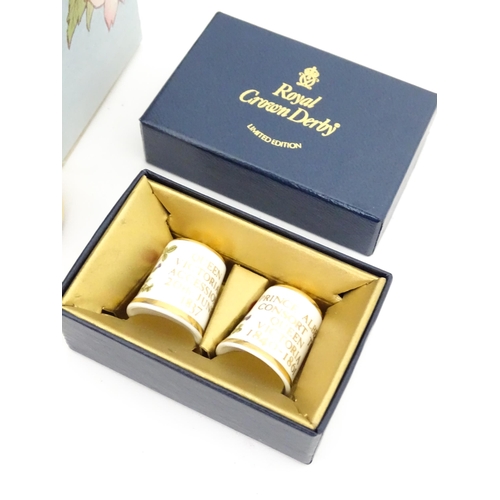 289 - A quantity of boxed Halcyon Days enamelled pill boxes and clock, together with boxed Royal Crown Der... 