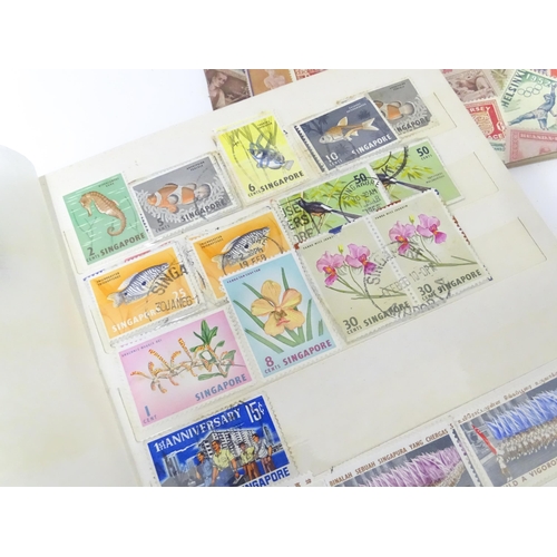 333 - Stamps: A quantity of assorted 20thC stamps, to include Singapore, Philippines, Vietnam, Spain, etc.... 