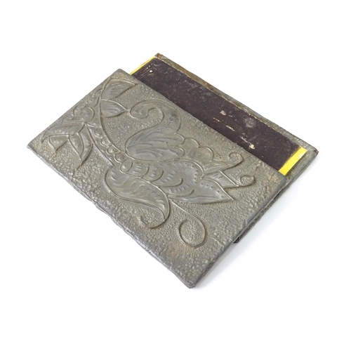 537 - Four assorted items, comprising an Art Nouveau pewter matchbox cover, a small hip flask and two Orie... 