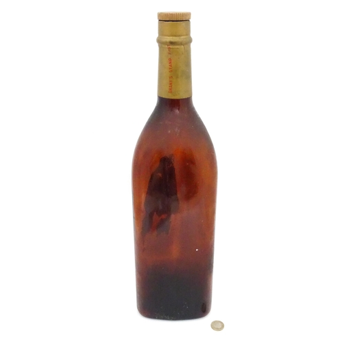 7 - A mid 20thC large Grants 'Hold Fast' Scotch whisky bottle, approx double magnum size, 20