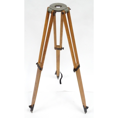 73 - A mid to late 20thC Stanley surveyor's tripod, constructed from maple with steel mounts, extending t... 