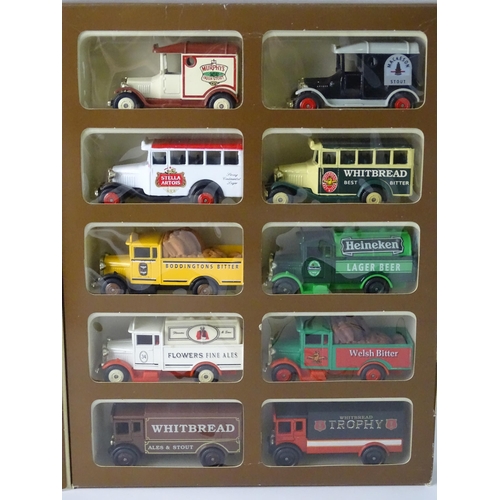 189 - Toys: a boxed Cameo Collections Whitbread brewery vehicle model set , together with a cog wheel puzz... 