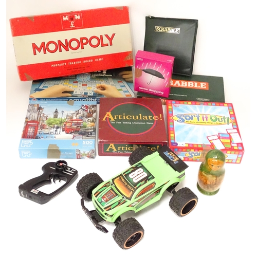 207 - A quantity of assorted board games to include Monopoly, Scrabble, etc. Together with a radio-control... 