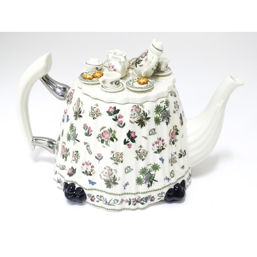 217 - A quantity of assorted ceramics to include novelty teapots, Sadler tea wares, etc. The largest 7 1/2... 