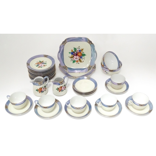 248 - A quantity of Noritake tea wares with floral decoration and lustre borders to include cups, saucers,... 