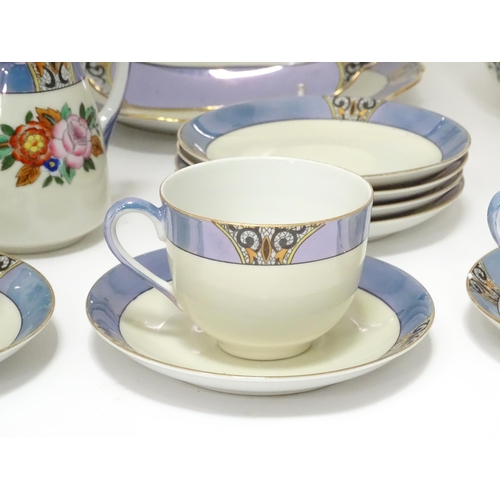 248 - A quantity of Noritake tea wares with floral decoration and lustre borders to include cups, saucers,... 