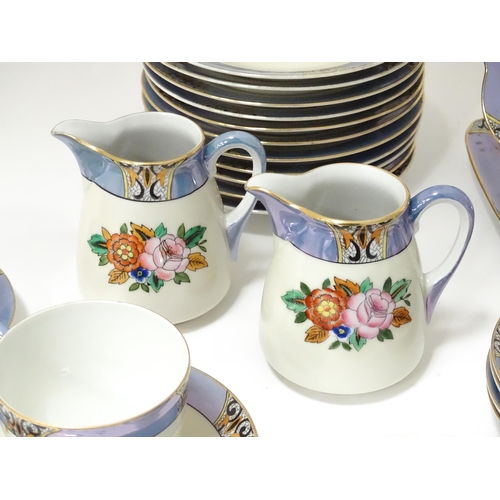 248 - A quantity of Noritake tea wares with floral decoration and lustre borders to include cups, saucers,... 