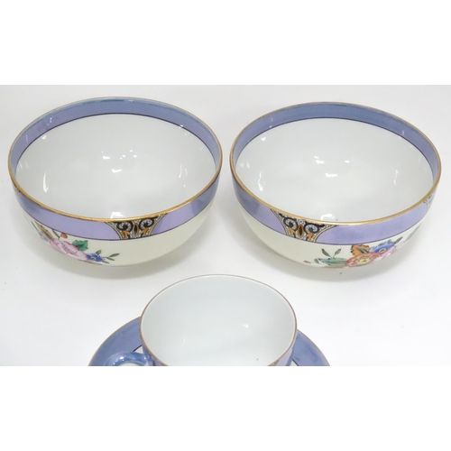 248 - A quantity of Noritake tea wares with floral decoration and lustre borders to include cups, saucers,... 