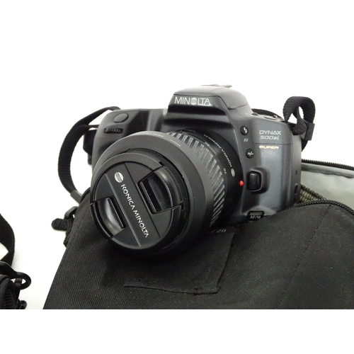 249 - A quantity of assorted cameras and accessories to include a Sony Alpha 3000 DSLR, a Sony DCR-SX44, a... 