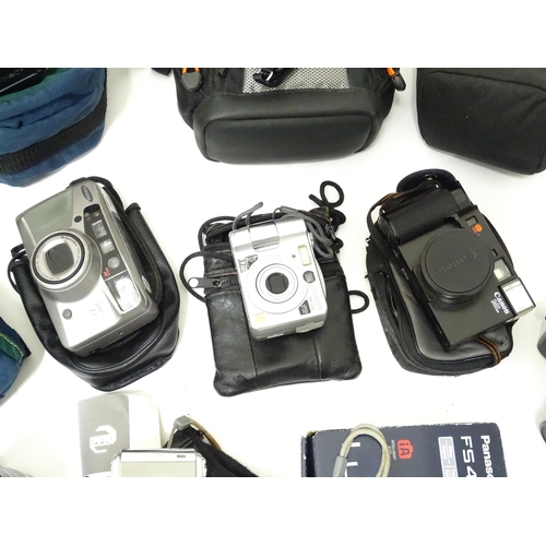 249 - A quantity of assorted cameras and accessories to include a Sony Alpha 3000 DSLR, a Sony DCR-SX44, a... 