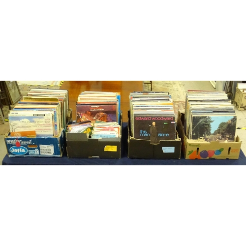 264 - A large quantity of mid to late 20thC vinyl 33rpm LPs / records and EPs / 45rpm singles , genres to ... 