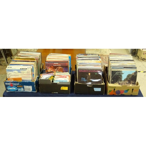 264 - A large quantity of mid to late 20thC vinyl 33rpm LPs / records and EPs / 45rpm singles , genres to ... 