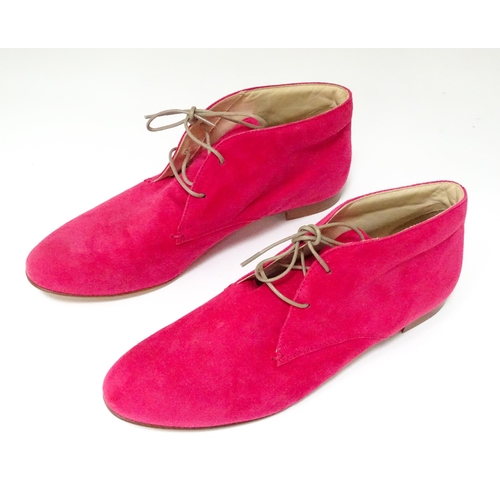 334 - Vintage Fashion: Two pairs of Tod's shoes to include a pair of pink suede lace-up boots in women's E... 