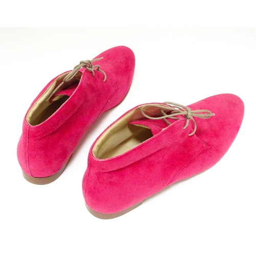 334 - Vintage Fashion: Two pairs of Tod's shoes to include a pair of pink suede lace-up boots in women's E... 