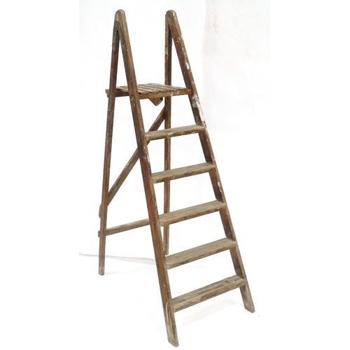 72 - A mid 20thC pine trestle stepladder, approx 67 1/2