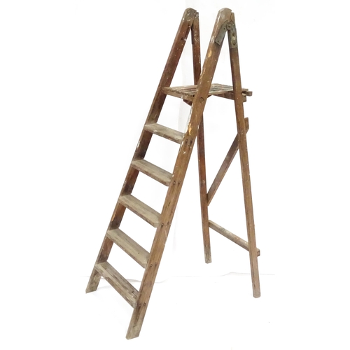 72 - A mid 20thC pine trestle stepladder, approx 67 1/2