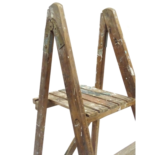 72 - A mid 20thC pine trestle stepladder, approx 67 1/2