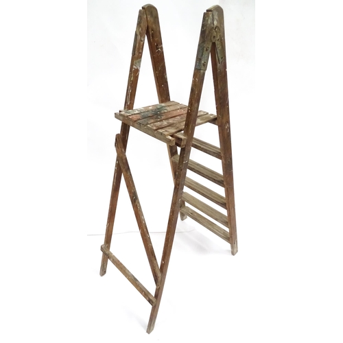 72 - A mid 20thC pine trestle stepladder, approx 67 1/2