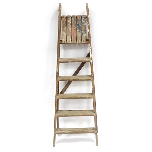 72 - A mid 20thC pine trestle stepladder, approx 67 1/2