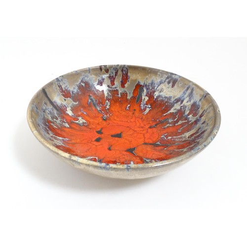 166 - A French Vallauris pottery bowl with Fat Lava style decoration. Marked under. Approx. 8