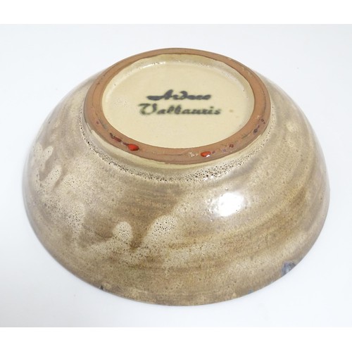 166 - A French Vallauris pottery bowl with Fat Lava style decoration. Marked under. Approx. 8