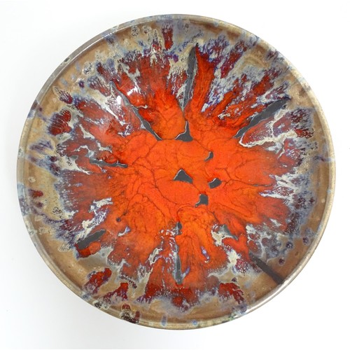 166 - A French Vallauris pottery bowl with Fat Lava style decoration. Marked under. Approx. 8