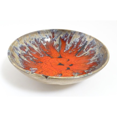 166 - A French Vallauris pottery bowl with Fat Lava style decoration. Marked under. Approx. 8