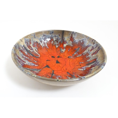 166 - A French Vallauris pottery bowl with Fat Lava style decoration. Marked under. Approx. 8