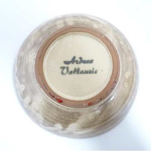 166 - A French Vallauris pottery bowl with Fat Lava style decoration. Marked under. Approx. 8