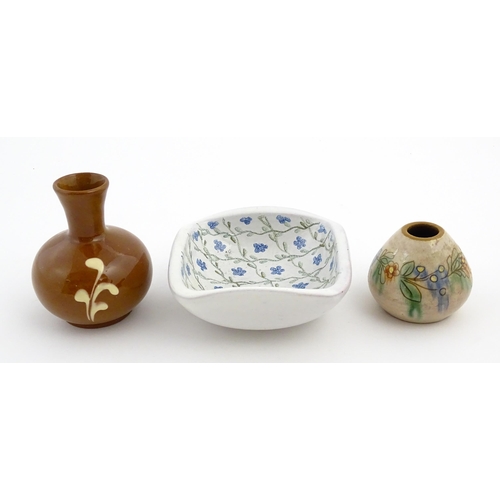 192 - A quantity of assorted ceramics to include three Swedish Nittsjo twin handled pots, a plate with han... 