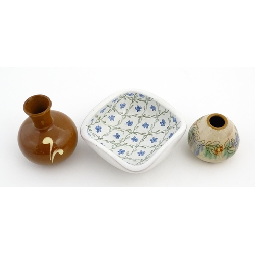 192 - A quantity of assorted ceramics to include three Swedish Nittsjo twin handled pots, a plate with han... 