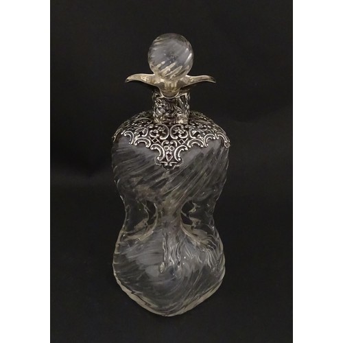 258 - A Victorian glass glug glug / pinch decanter with a pierced silver mount hallmarked London 1898, mak... 