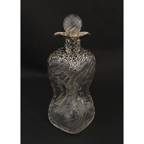 258 - A Victorian glass glug glug / pinch decanter with a pierced silver mount hallmarked London 1898, mak... 